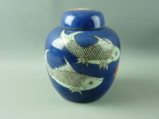 A MID TO LATE 19th CENTURY ORIENTAL LIDDED GINGER JAR, mottled deep blue ground and with a body