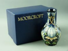 A MOORCROFT 'A TRIBUTE TO WILLIAM MORRIS' VASE, designed by Rachel Bishop, decorated on a cobalt