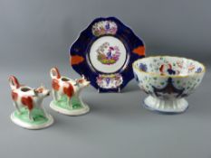 A PAIR OF 19th CENTURY STAFFORDSHIRE COW CREAMERS, a Gaudy Welsh 'Pagoda' fruit bowl and a