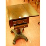 A REGENCY MAHOGANY TWIN FLAP PEDESTAL SIDE TABLE, the rectangular top over twin end drawers and