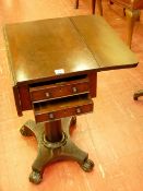 A REGENCY MAHOGANY TWIN FLAP PEDESTAL SIDE TABLE, the rectangular top over twin end drawers and