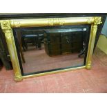 A 19th CENTURY EMPIRE STYLE GILT OVERMANTEL MIRROR with baton and acanthus leaf decoration, reeded