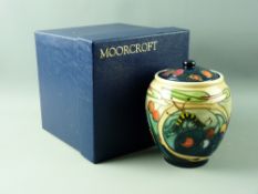 A MOORCROFT 'HARTGRIND' JAR & COVER, designed by Emma Bossons, decorated on a multi-tonal ground