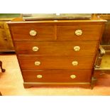 A CIRCA 1900 LINE INLAID MAHOGANY CHEST of two short over three long drawers, with later polished