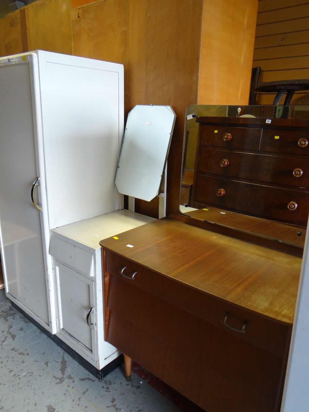 A vintage white painted child's dressing table wardrobe unit together with a vintage Avalon Yatton