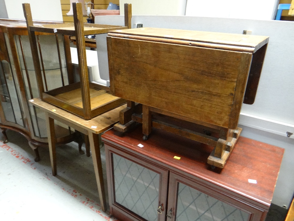 A neat vintage oak drop leaf side table together with a TV cabinet and two other tables