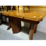 Mahogany veneered Art Deco-style extending dining table