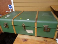 A vintage wooden banded travel trunk