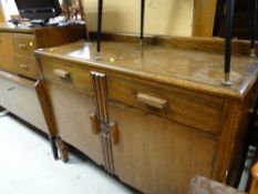 A vintage oak two door two-drawer sideboard together with a Beautility vintage sideboard with drinks