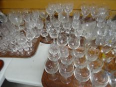 Three trays of various drinking glasses