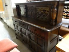 A darkwood Priory-style sideboard / low dresser with two lead glazed upper cupboards