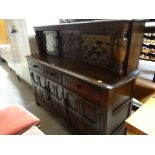 A darkwood Priory-style sideboard / low dresser with two lead glazed upper cupboards