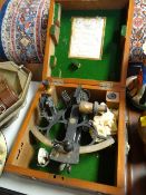 A wooden cased Sextant