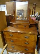 A vintage three-drawer dressing table with upper drawer & mirror