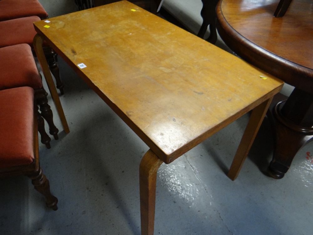 A 1930s lightwood office-style table designed by Alvar Aalto for Finmar