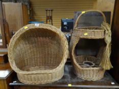 A wicker animal basket together with a wicker wine carrier