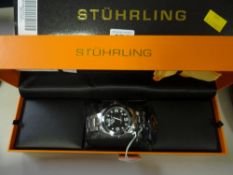 A boxed Stuhrling steel bracelet diving watch