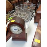 Mahogany inlaid dome mantel clock together with a glass vase