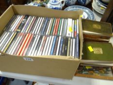 Collection of various country and easy listening CDs & a small parcel of leather bound volumes of