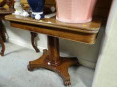 A good lightwood Regency-style foldover tea table on a column support and splayed feet