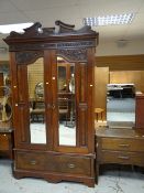 Parcel of bedroom furniture to include an Edwardian double mirror doored and carved wardrobe