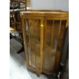 Vintage light oak bow-fronted display cabinet