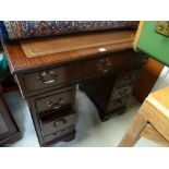 A good neat small reproduction mahogany ladies' kneehole desk by Morris