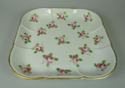 A (BELIEVED) SWANSEA PORCELAIN CRUCIFORM SQUARE DISH painted with scattered open pink roses within a