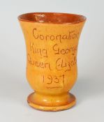 A CLAY-PITS EWENNY POTTERY GOBLET with ochre glaze inscribed 'Coronation King George VI Queen