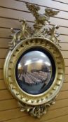 AN EMPIRE PERIOD GILT WOOD CONVEX MIRROR FROM THE HOME OF DAVID LLOYD GEORGE having a reeded black