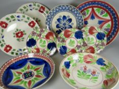 A COLLECTION OF NINE WELSH SPONGE WARE POTTERY PLATES / DISHES, various sizes