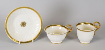 SWANSEA PORCELAIN Paris flute trio comprising coffee-can, tea-cup and saucer with borders and