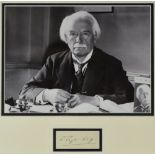 DAVID LLOYD GEORGE autograph - framed together with a black and white photograph of the Statesman at