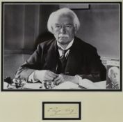 DAVID LLOYD GEORGE autograph - framed together with a black and white photograph of the Statesman at