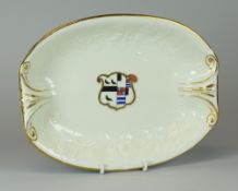 A SWANSEA PORCELAIN OVAL HERALDIC DISH circa 1814-26 having a coat of arms for Lockwood impaling