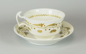 A SWANSEA PORCELAIN BREAKFAST CUP & SAUCER decorated with gilded vines, stencilled SWANSEA mark