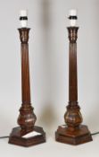 FRENCH MAKER mahogany - pair of reeded table-lamps on haxagonal bases, the sconces with lambrequin