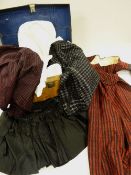 A LARGE COLLECTION OF TRADITIONAL WELSH CLOTHING, circa 1900-1910 and including skirts / underskirts
