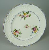 A NANTGARW PORCELAIN PLATE, London decorated by Mortlock's of Oxford Street and being of lobed