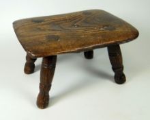 A CHARMING NINETEENTH CENTURY ELM LACEMAKER'S STOOL from a Newport, Gwent family, of rounded