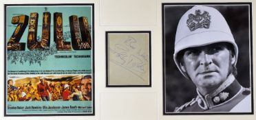 STANLEY BAKER autograph - signed 'Best Wishes...' and framed together with a 'Zulu' cinema poster