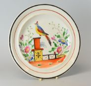 A DILLWYN & CO SWANSEA POTTERY PLATE 'Bird on Pedestal' pattern with colourful decoration, impressed
