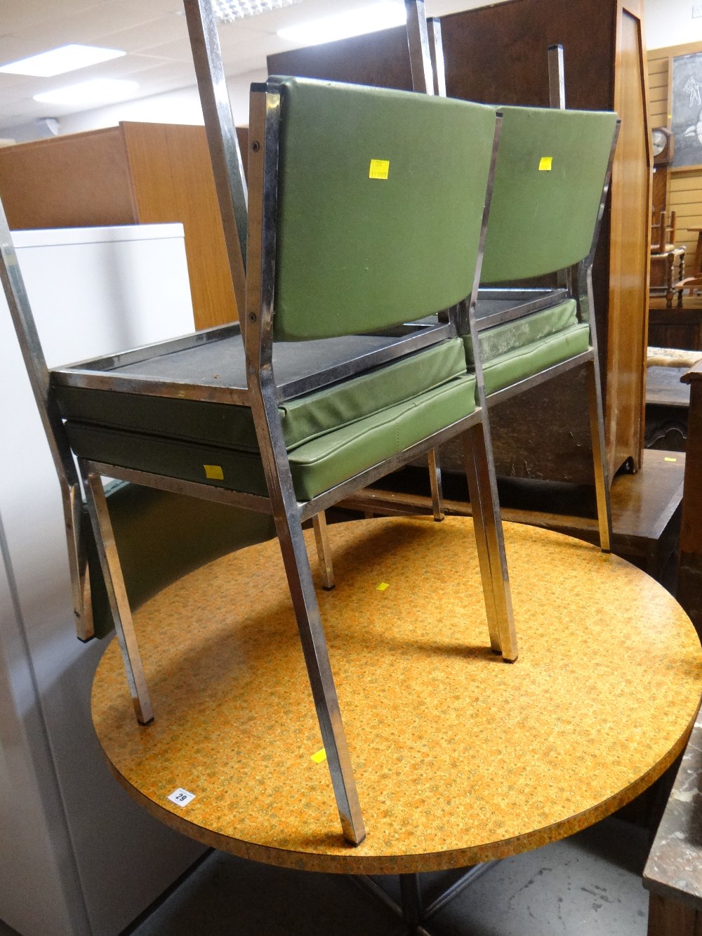 A wonderfully retro floral Formica topped circular breakfast table & four retro similar period