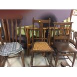 Parcel of chairs to include a small dark stained rocker, an oak church chair, barley-twist & rattan