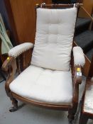 A semi-upholstered spindle sided vintage armchair