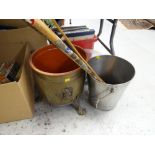 A brass log bin on claw feet, sundry walking sticks etc