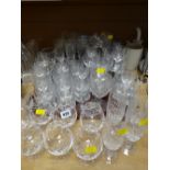 A large quantity of drinking glasses