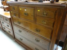 A pitch pine chest in the Scottish style formed of three long, four short & middle hat drawer