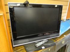 A Wharfdale flatscreen TV & remote control