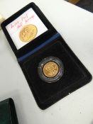 A 1979 cased gold full sovereign